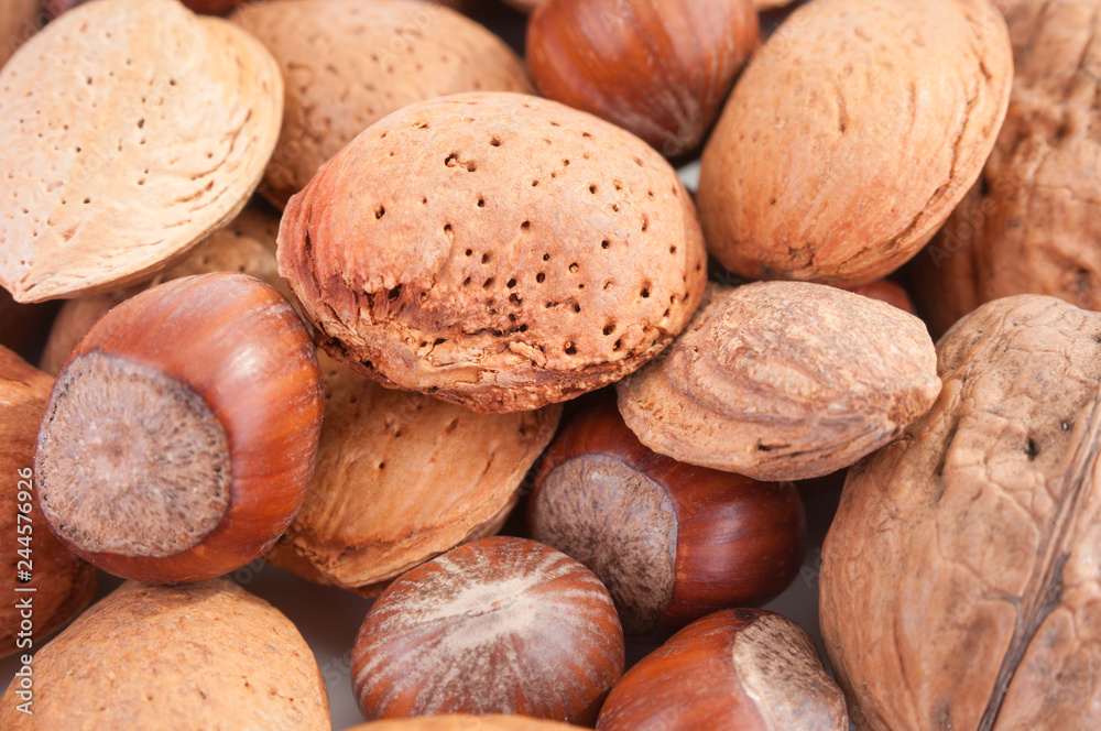 Top view on different nuts close up Top view on different nuts close up