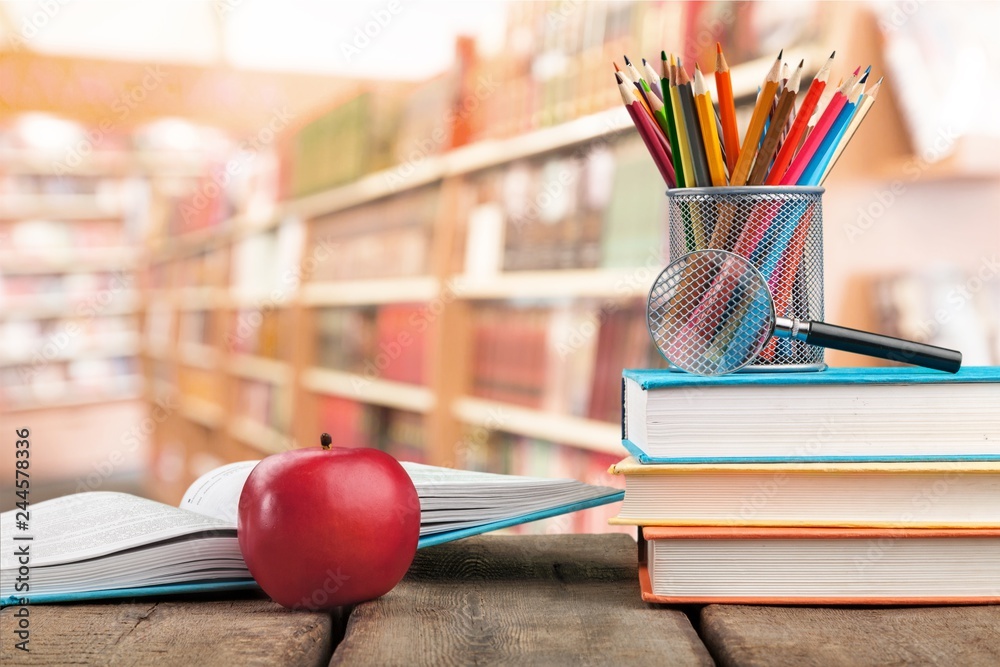 Stack of colorful books and fresh apple Stack of colorful books and fresh apple