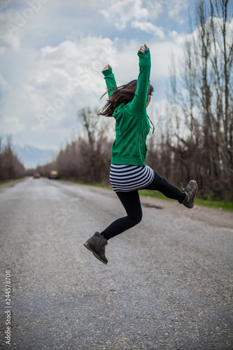 girl jumping outside