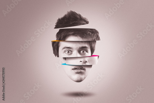 Split personality concept. Isolated cutout head of person with mental health disorder photo