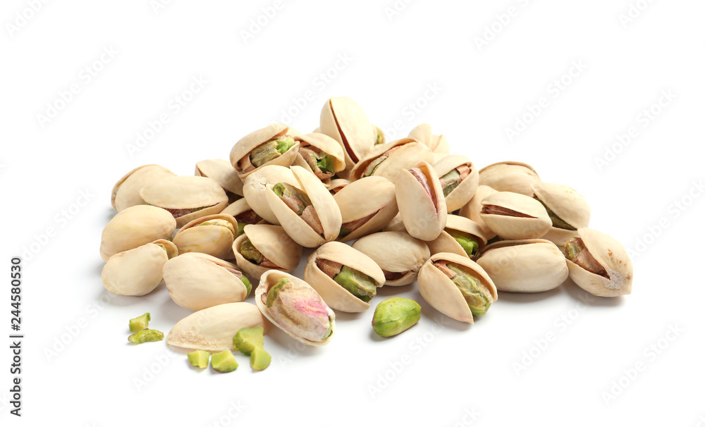 Heap of organic pistachio nuts isolated on white Heap of organic pistachio nuts isolated on white