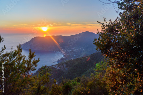 View of Monterosso al mare and Punta Mesco at sunset. Cinque Terre. Italy