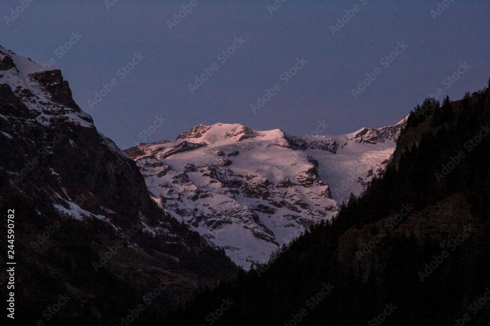 Panoramic view of the Gressoney valley at sunset in winter