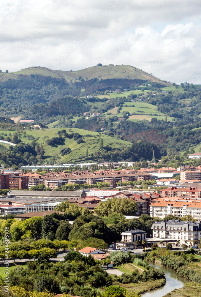 Zarautz in the Basque Country, Spain, on a sunny day with the mountains in the background