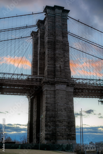 View of the Brooklyn Bridge and Manhattan from the riverside of the East River at sunset - 7