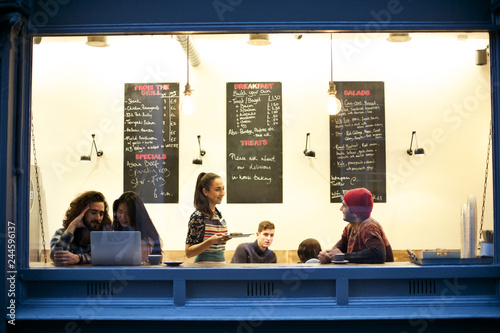 Group of people in a busy coffee shop