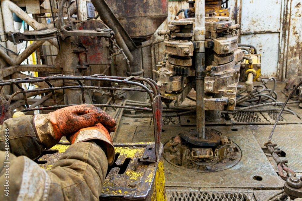 Offshore oil rig worker prepare tool and equipment for perforation oil ...