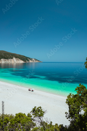 Couple enjoying the summer on one of the most beautiful beaches of Greece on Kefalonia Island Ionian islands. Summer adventure vacation holiday luxury travel romantic honeymooning concept
