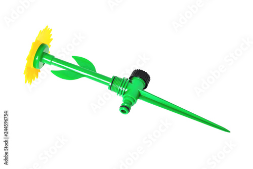 water spray for lawn irrigation yellow-green in the shape of a flower close-up white background