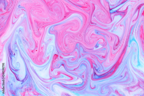 Abstract multicolored background. Fine art of pink blue. Blue pink texture. Colored paint stains in the liquid. Art