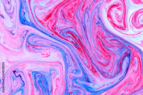 Abstract multicolored background. Fine art of pink blue. Blue pink texture. Colored paint stains in the liquid. Art