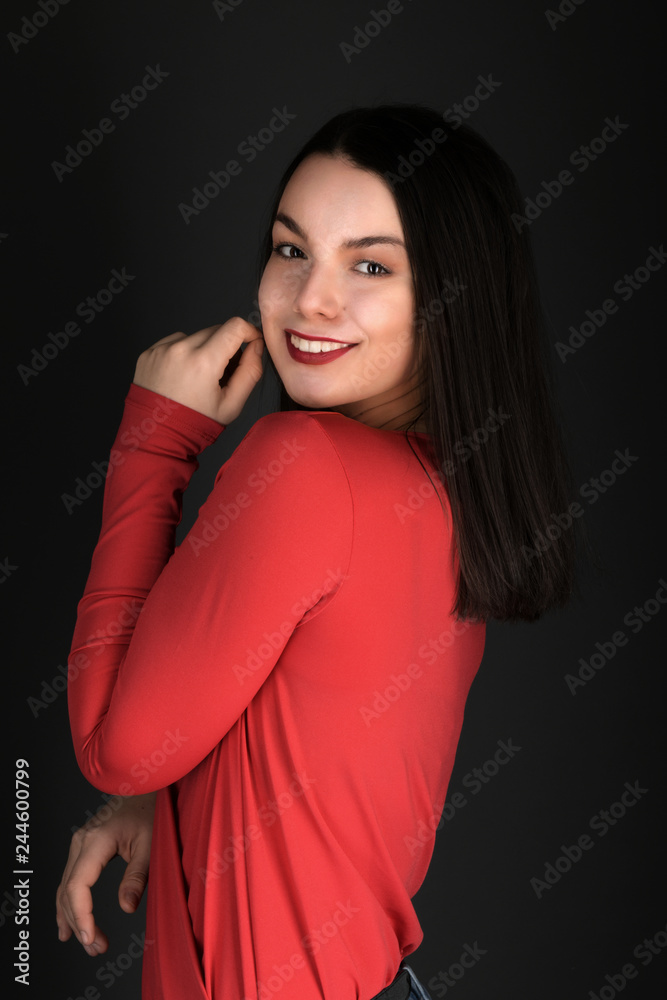 Portrait of a beautiful young woman in red dress Portrait of a beautiful young woman in red dress