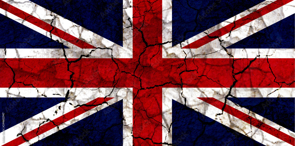 Fototapeta premium united kingdom UK country flag painted on a cracked grungy wall