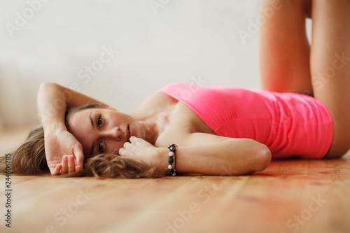 Beautiful young girl posing in home photo studio