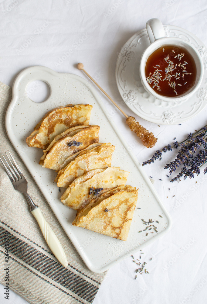 Homemade Pancakes with Honey, Tea, Lavender Flowers, Easy Food Concept Breakfast Homemade Pancakes with Honey, Tea, Lavender Flowers, Easy Food Concept Breakfast