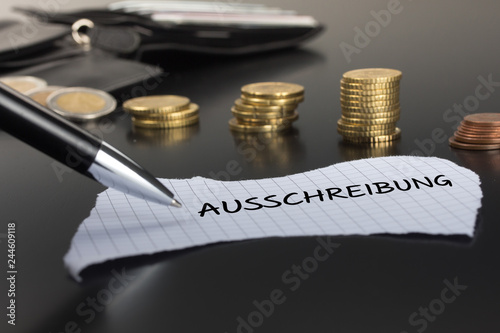 Ausschreibung auf einem Zettel