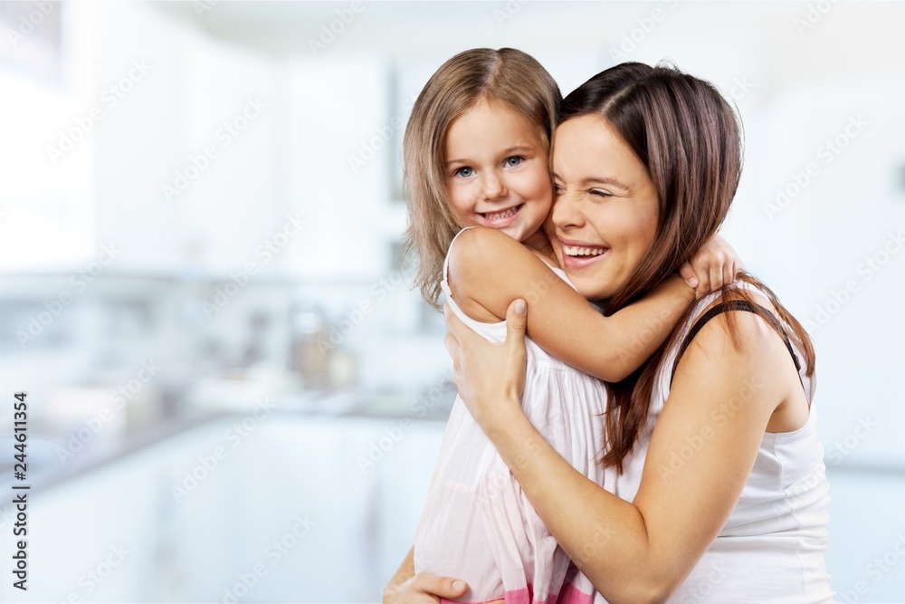 Happy Mother and daughter hugging Happy Mother and daughter hugging