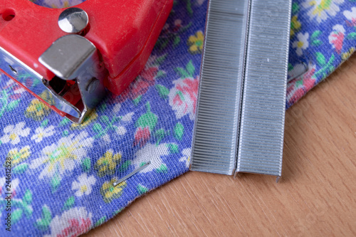 Tacker and Staples used to upholster furniture. Accessories for employees in the carpentry shop.