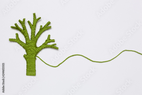 green yarn tree isolated on white. Eco concept