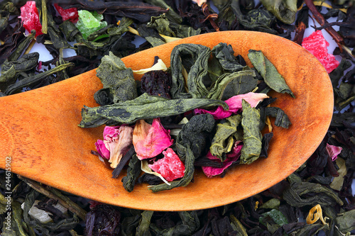 Dried leaves of green and black tea. photo