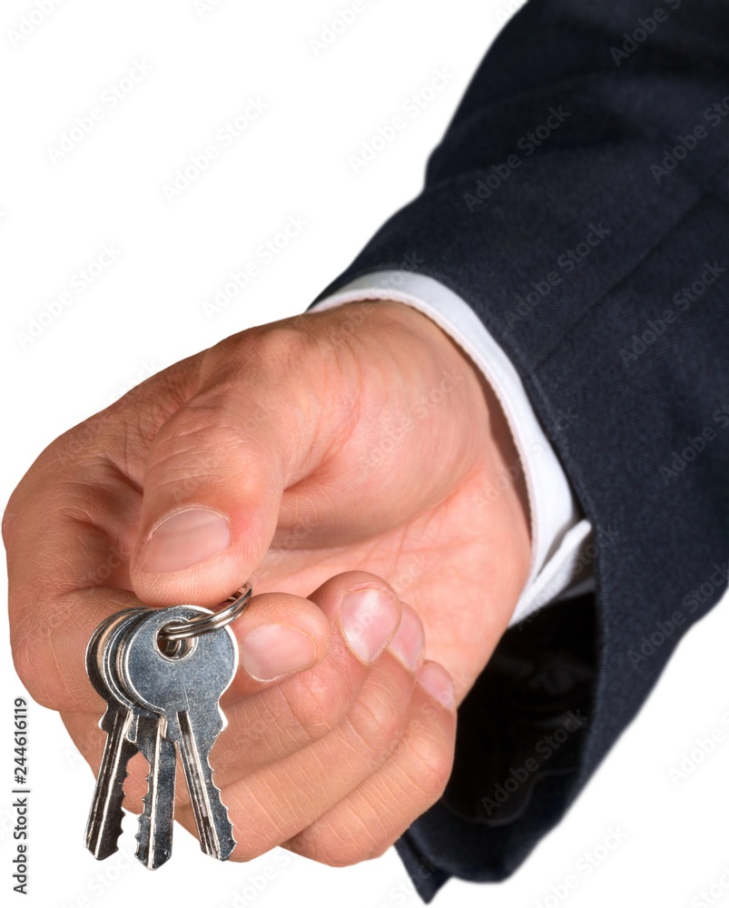 Businessman Holding Keys