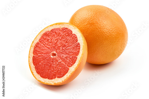 Half of Citrus Fruit. Ripe Juicy pink grapefruit, close-up, isolated on a white background