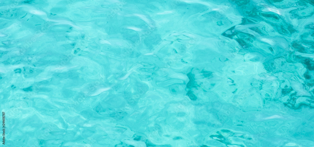 Background shot of aqua sea water surface