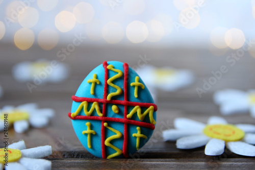 easter cookie egg on wooden background photo