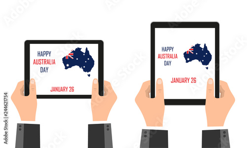 The mainland of Australia, in the colors of the Australian flag, is depicted in mobile devices that are held in their hands. Festive day of Australia. January 26