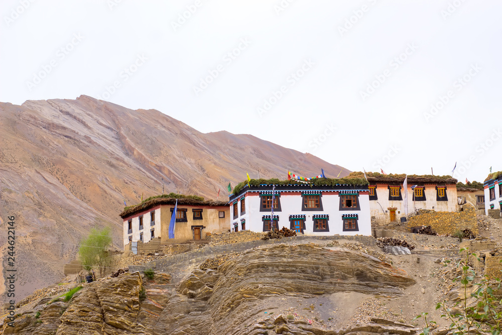 Small Tibetan houses stand on the mountain Small Tibetan houses stand on the mountain