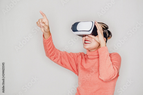 Asian women laugh and enjoy using VR