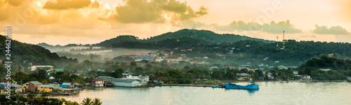 Panorama of Coxen Hole, Roatan with fog in first morning light. photo