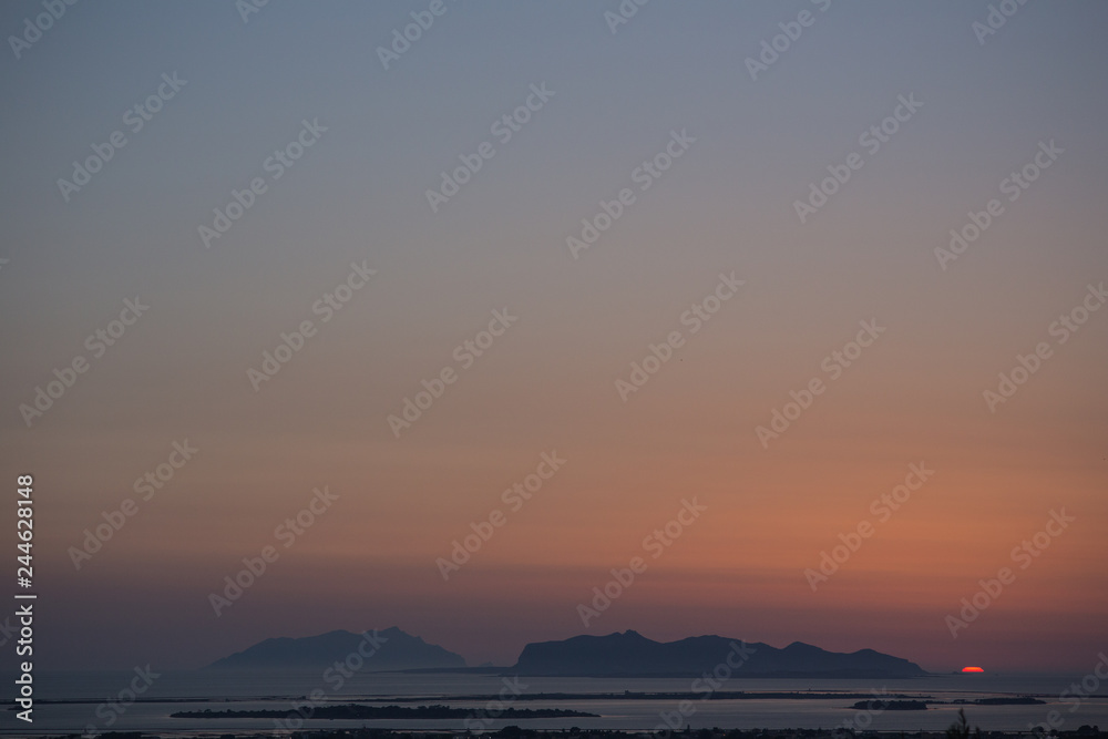 Sunset with islands and sky