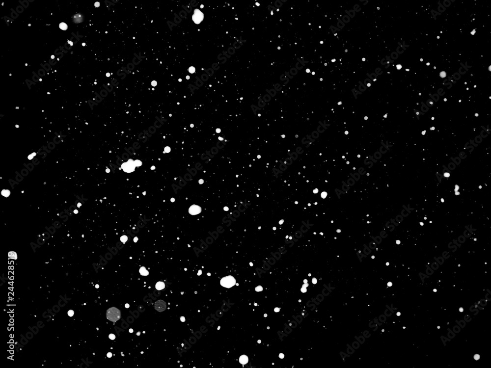 Texture of snow isolated on black background