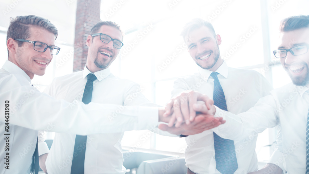 smiling employees of the company folded the tower from his hands smiling employees of the company folded the tower from his hands
