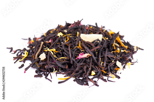 Black ceylon tea with rose petals, cornflowers, sunflower and almond slices, isolated on white background.