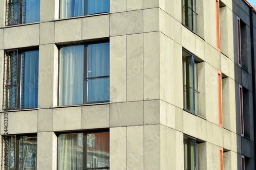 Modern apartment buildings on a sunny day with a blue sky. Facade of a modern apartment building