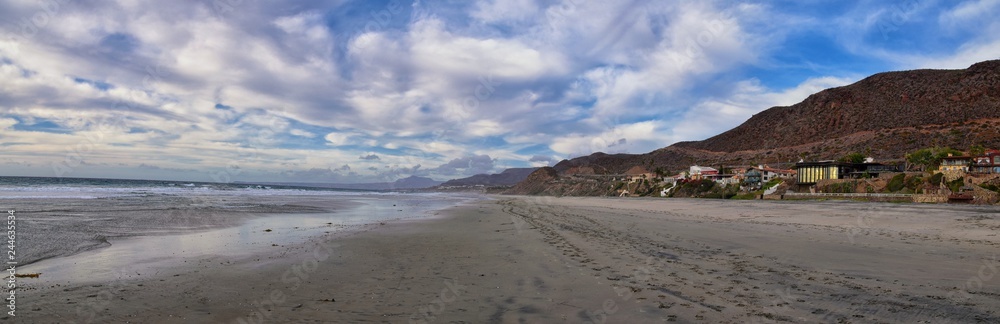 La Mision Valley landscapes and Beach in Mexico on the West Coast a small canyon near the Pacific Ocean that houses the Door of Faith and Buena Vida Orphanage, South of Tijuana, Mexico. La Mision Valley landscapes and Beach in Mexico on the West Coast a small canyon near the Pacific Ocean that houses the Door of Faith and Buena Vida Orphanage, South of Tijuana, Mexico.