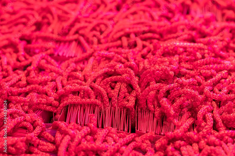 Many red-colored thread ropes. Many red-colored thread ropes.