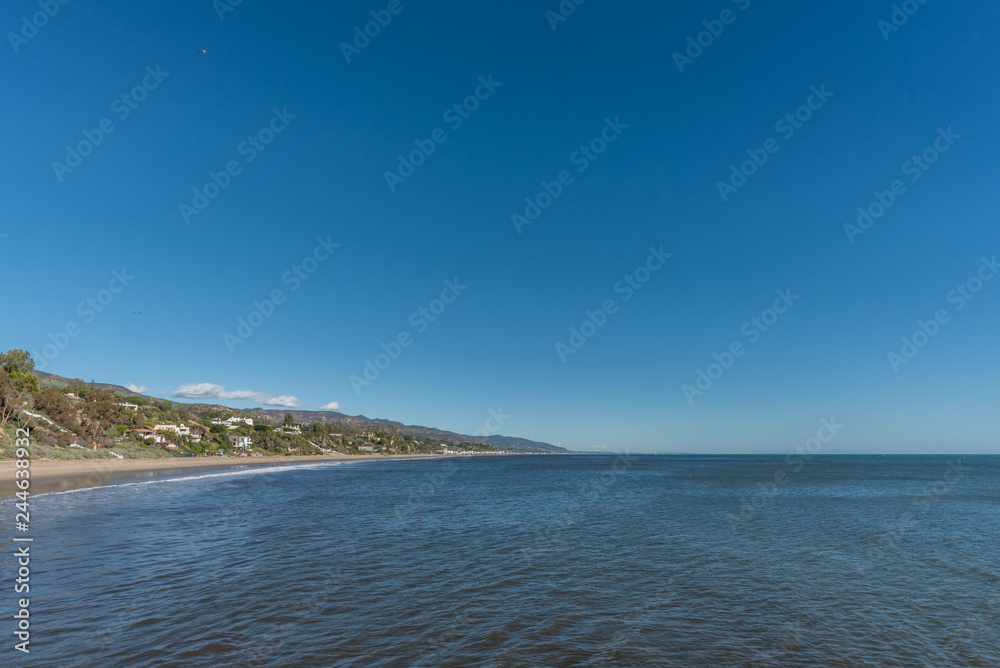 Panoramic view of Malibu coastline taken from a pier in Paradise Cove, Malibu, California, on a very clear winter day