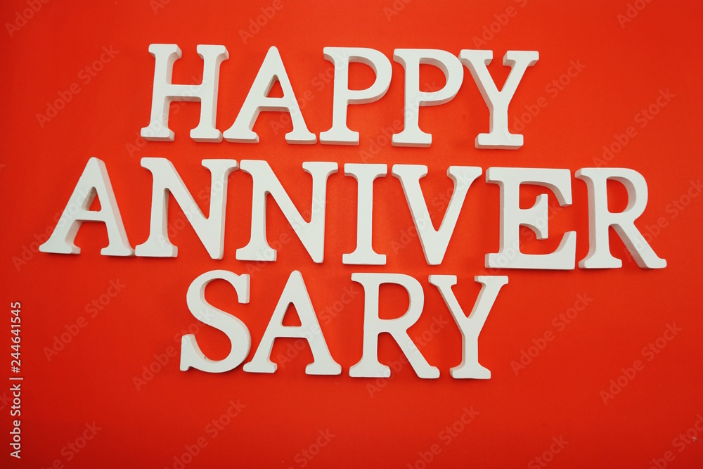 Happy Anniversary alphabet letters on red background