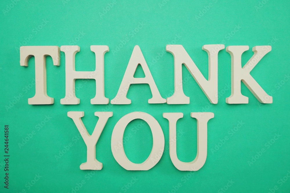 Thank You alphabet letters on green background