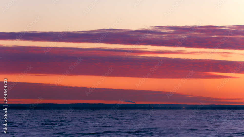 Sunset pink and red clouds over the lake Sunset pink and red clouds over the lake
