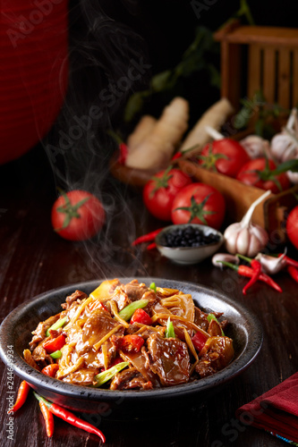 Delicious Chinese cuisine, beef with tomato and skin in clay pot