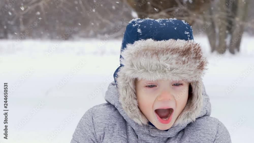 Cute little boy kid playing with toy truck and snow in winter. two years old child Cute little boy kid playing with toy truck and snow in winter. two years old child
