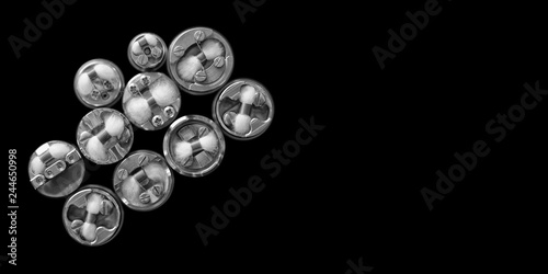 black and white, monochrome shot, top view of single micro coil with japanese organic cotton wick in high end rebuildable dripping atomizers isolated on black background, selective focus
