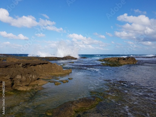 rocky shore at beach with tidepools in Isabela, Puerto Rico