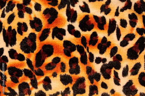 Textured background showing close up of leopard spots.