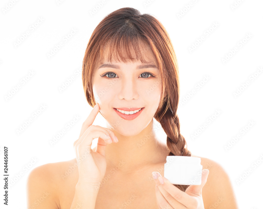 closeup young beauty face showing skin care product closeup young beauty face showing skin care product