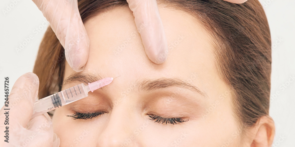 Prp plasma treatment. Facial rich cosmetology injecting. Woman, doctor hands. Patient clinic